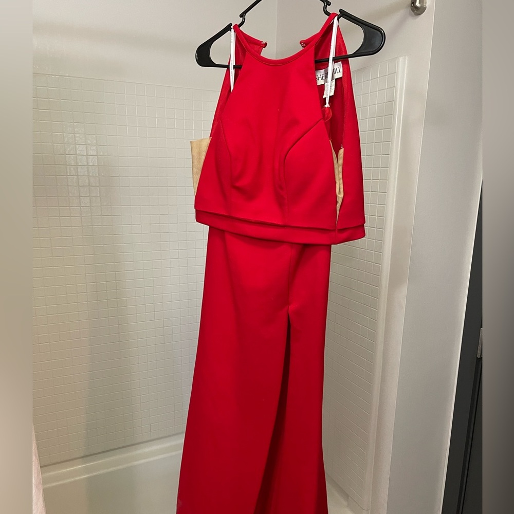 Sherri Hill two piece gown is so flattering and attractive